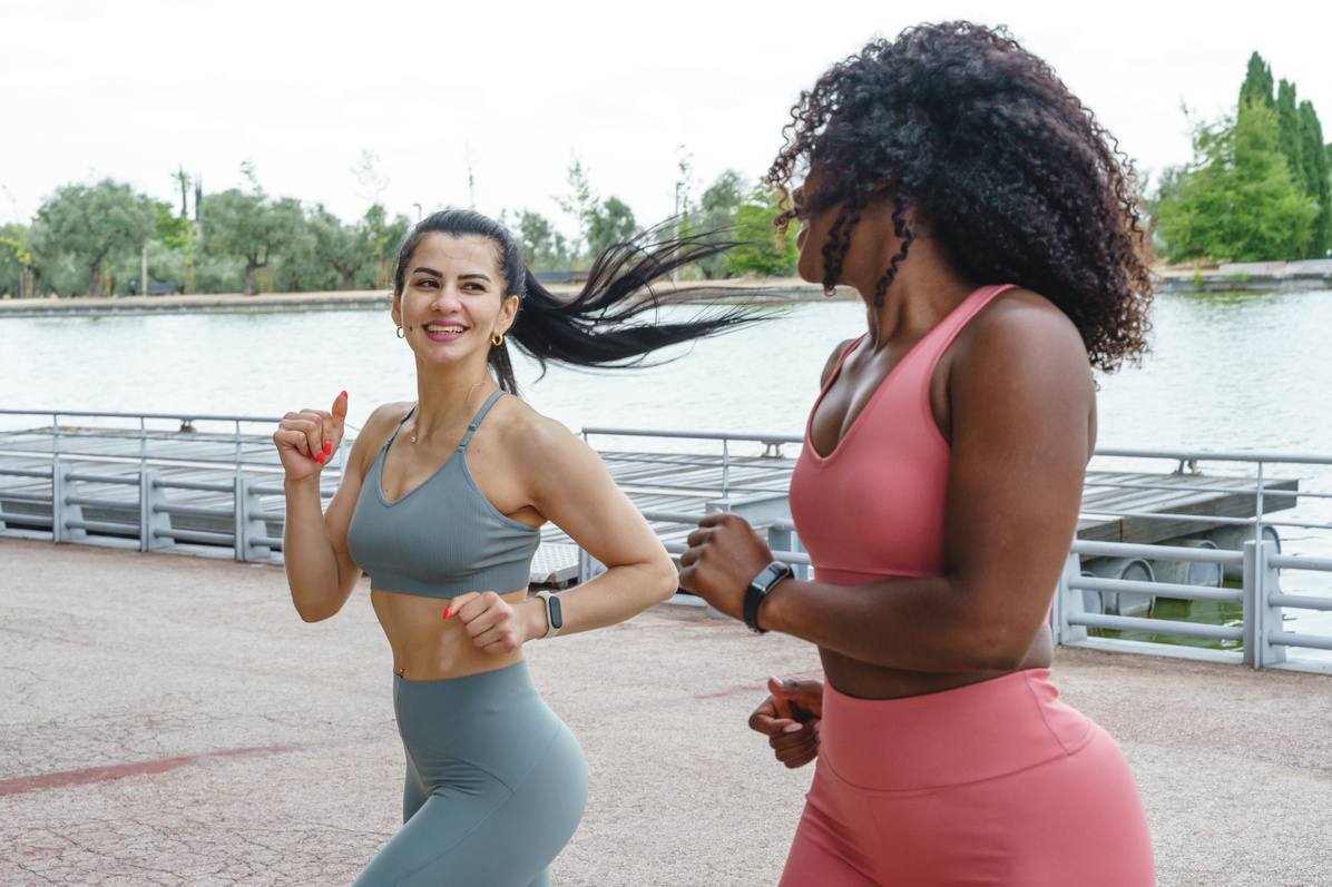 Fitness women running together.